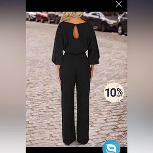 Long sleeve loose ladies formal jump suit. size M. The fit is small. Black